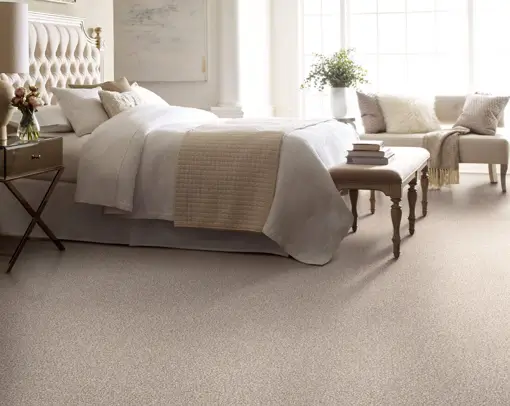 neutral carpet in a bedroom | Donald E. McNabb Flooring