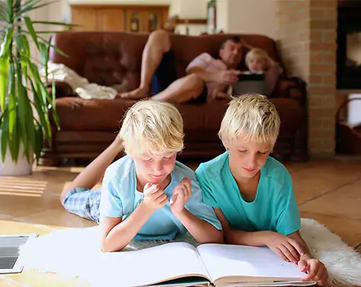 Boys doing study | Donald E. McNabb Flooring