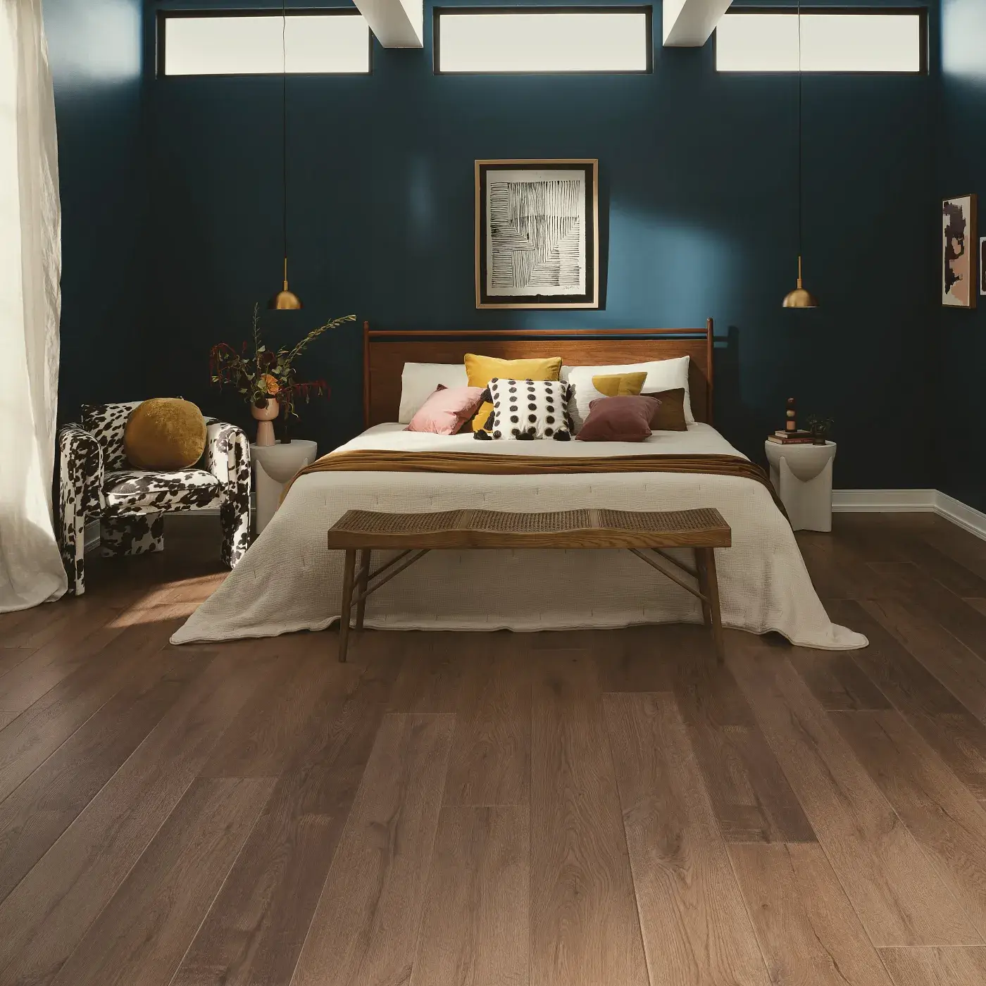 VV810_04027_ROOM COREtec Luxury Vinyl in a medium brown wood tone in a bedroom | Donald E. McNabb Flooring